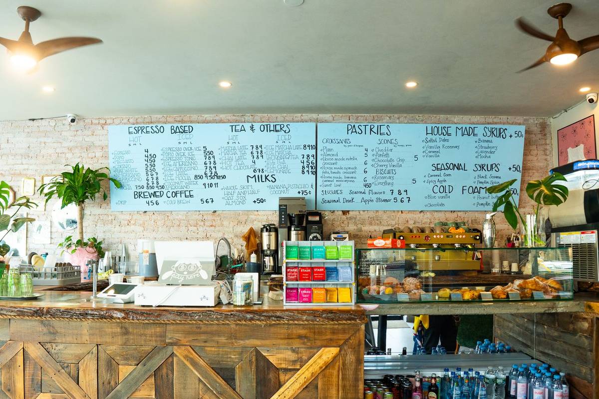 Coffee, tea and pastry chalkboard menu at the Nova Cafe counter