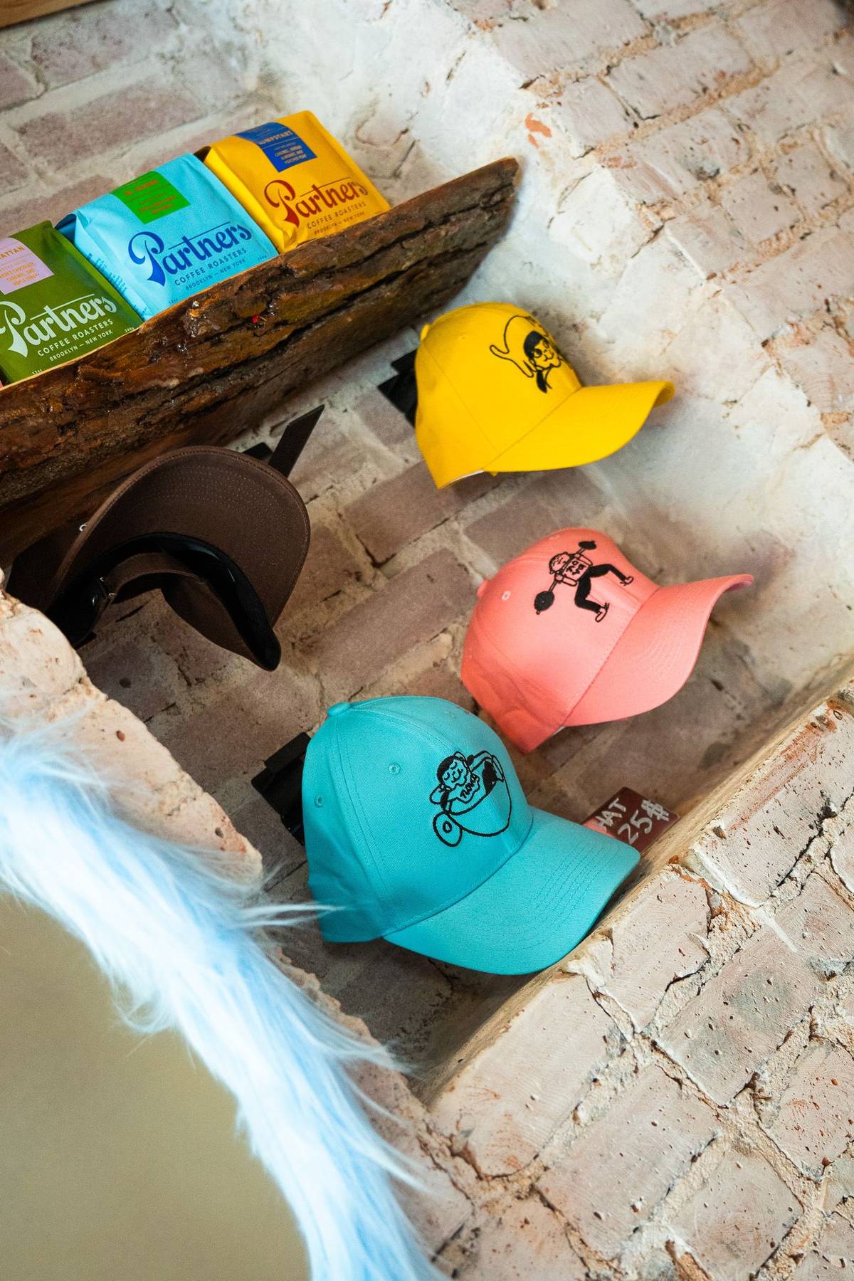 Caps and coffee, side by side