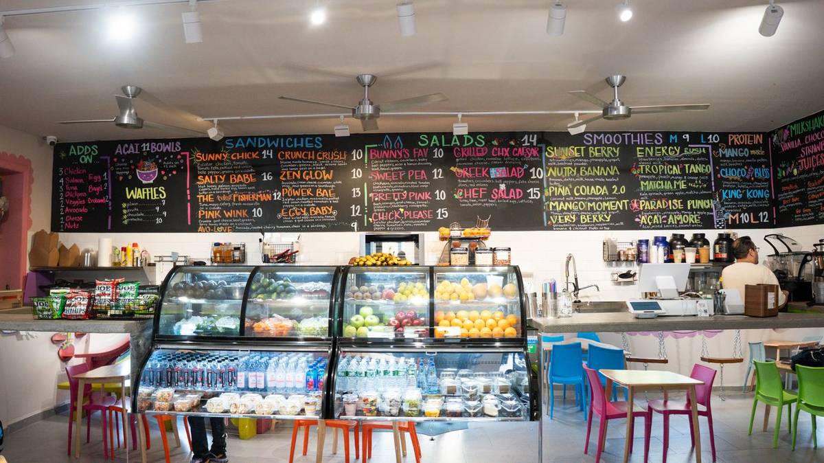 Nova Cafe juice bar counter with fresh fruit display case